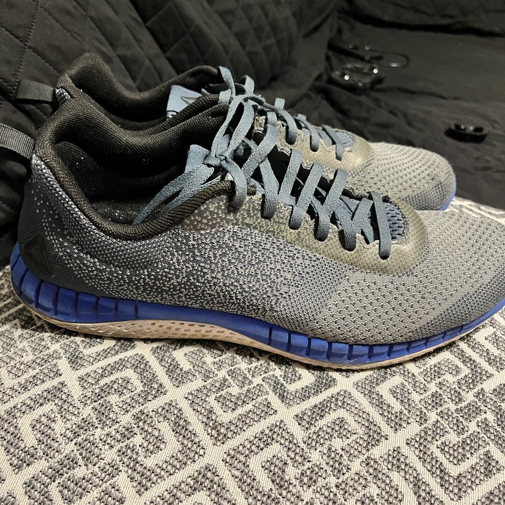 Black and blue reebok, size 11.5 in men